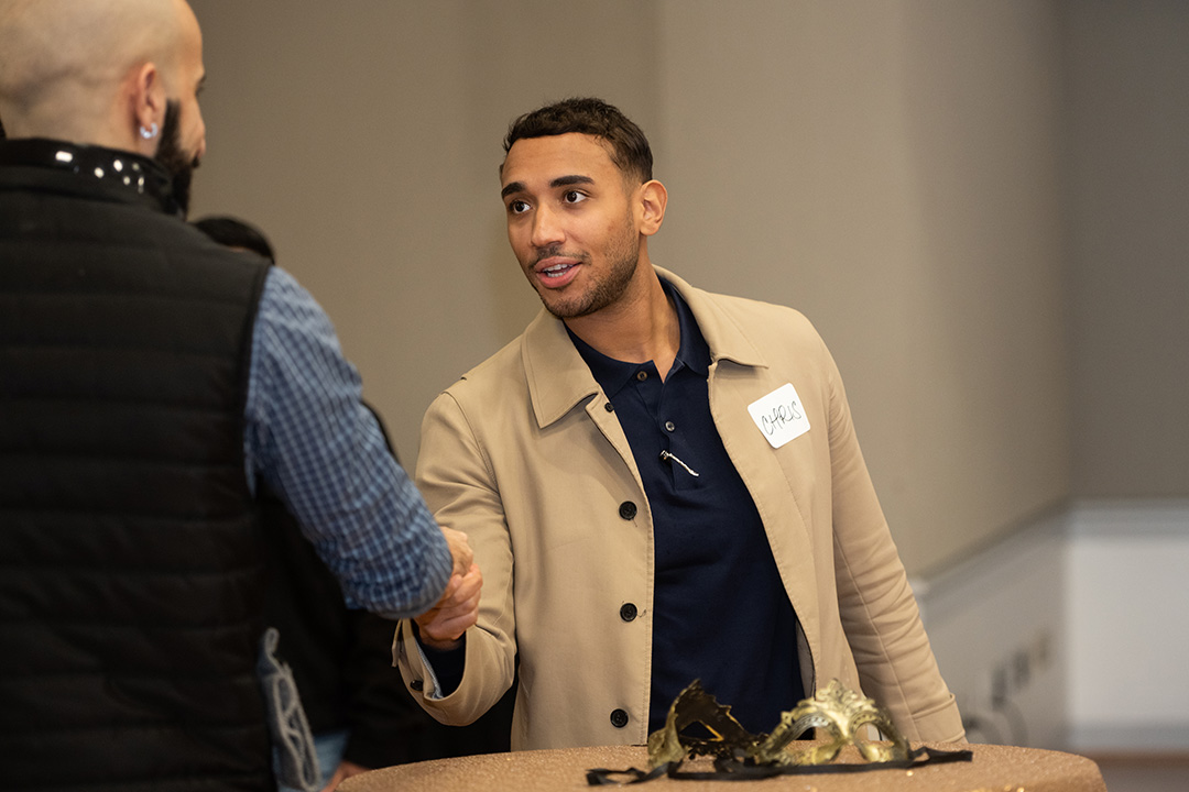two people shaking hands