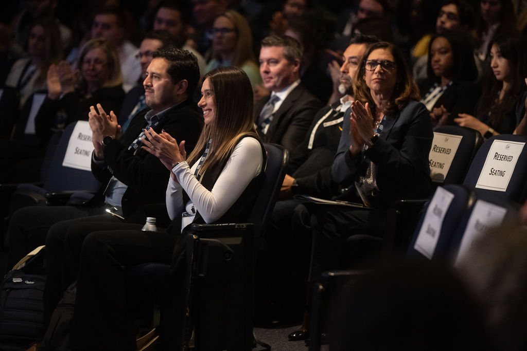 people cheering in audience 
